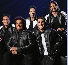 A group of men in leather jackets posing for the camera.